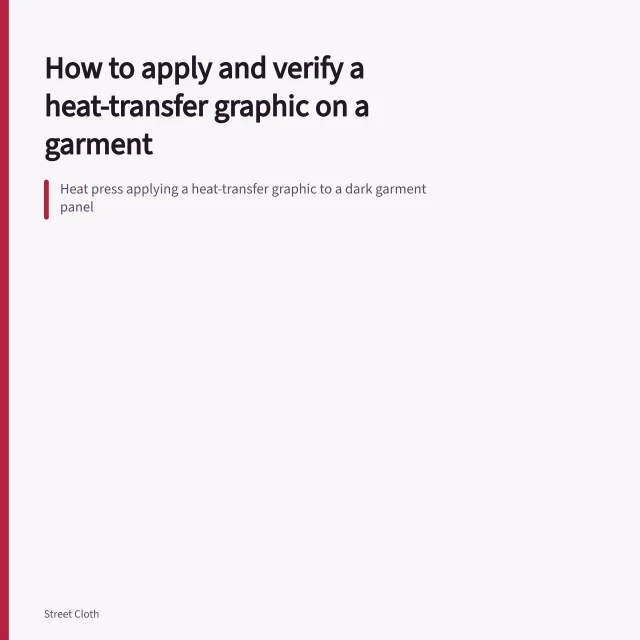 Heat press applying a heat-transfer graphic to a dark garment panel. How to apply and verify a heat-transfer graphic on a garment
